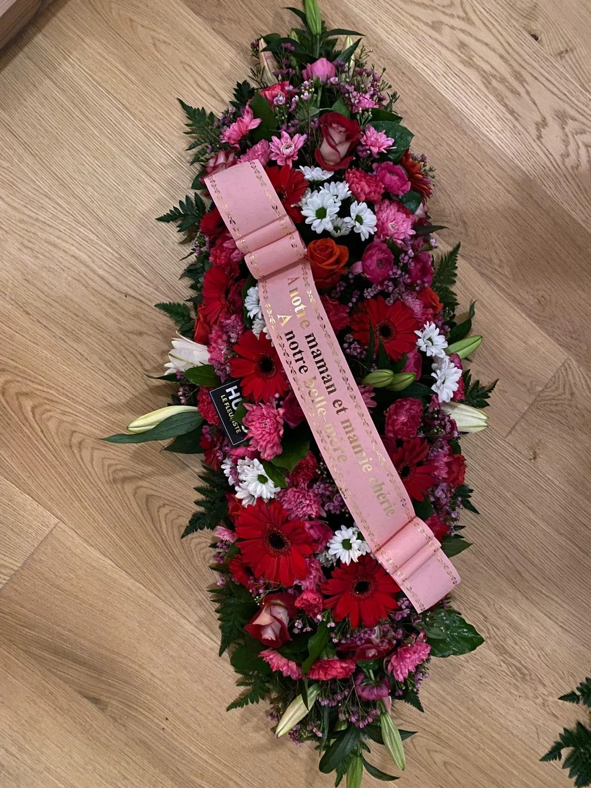Gerbe et dessus de cercueil Hugo le Fleuriste